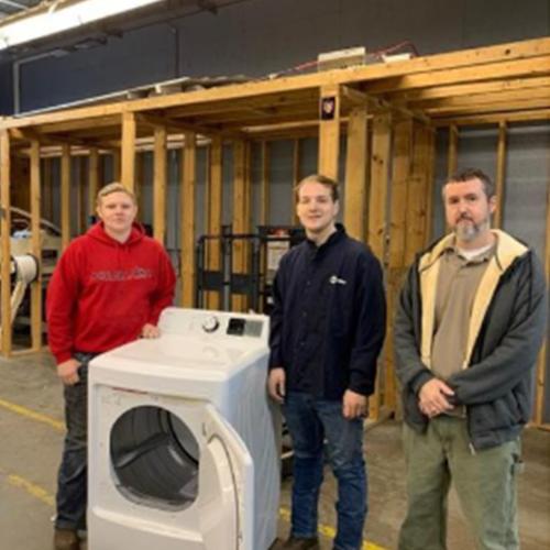 Floyd CArea Technology Center students receive gas dryers from Operation Sharing. 