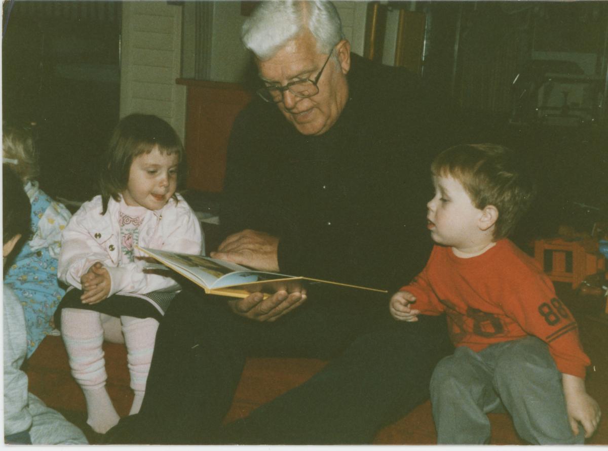 CAP Founder Reverend Ralph Beiting reads to children in Appalachia