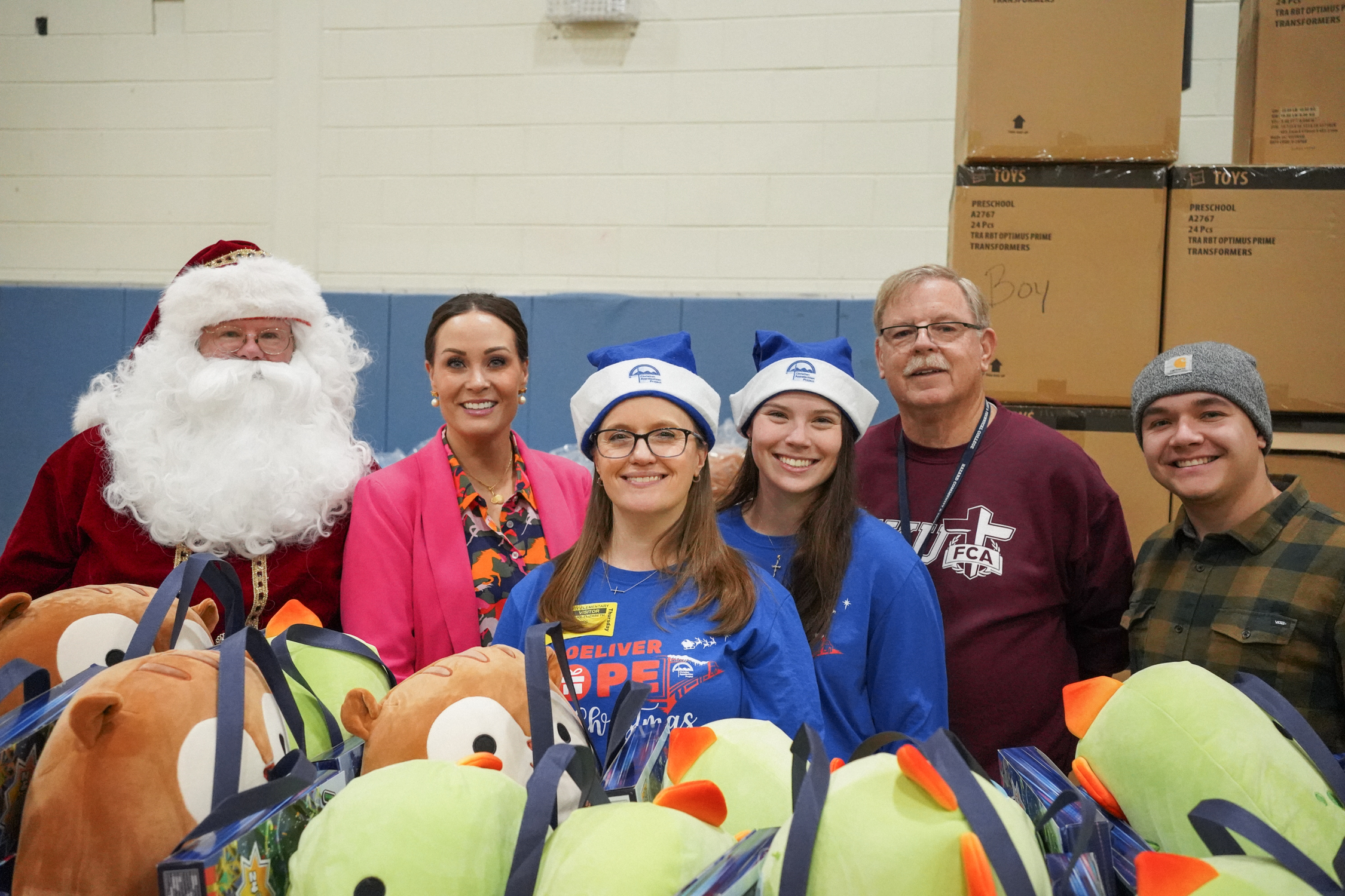 Lt. Governor Coleman with CAP staff at Lee Elementary Christmas Distribution